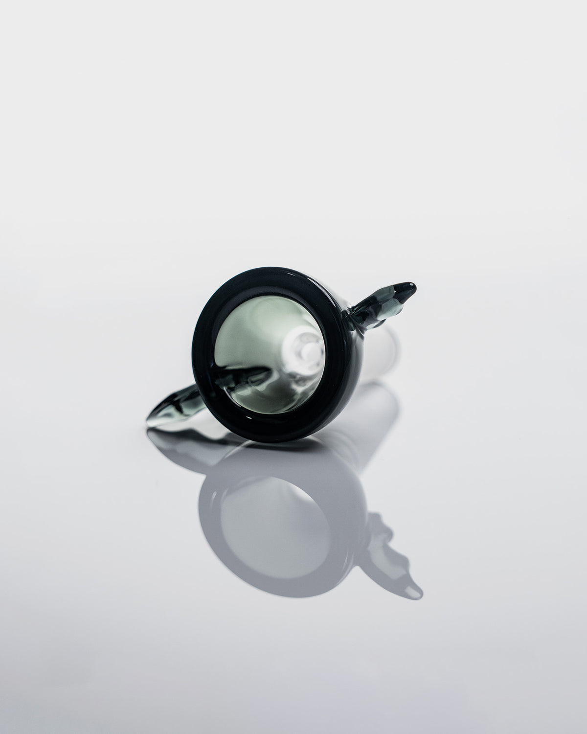 black bat bowl against a white background
