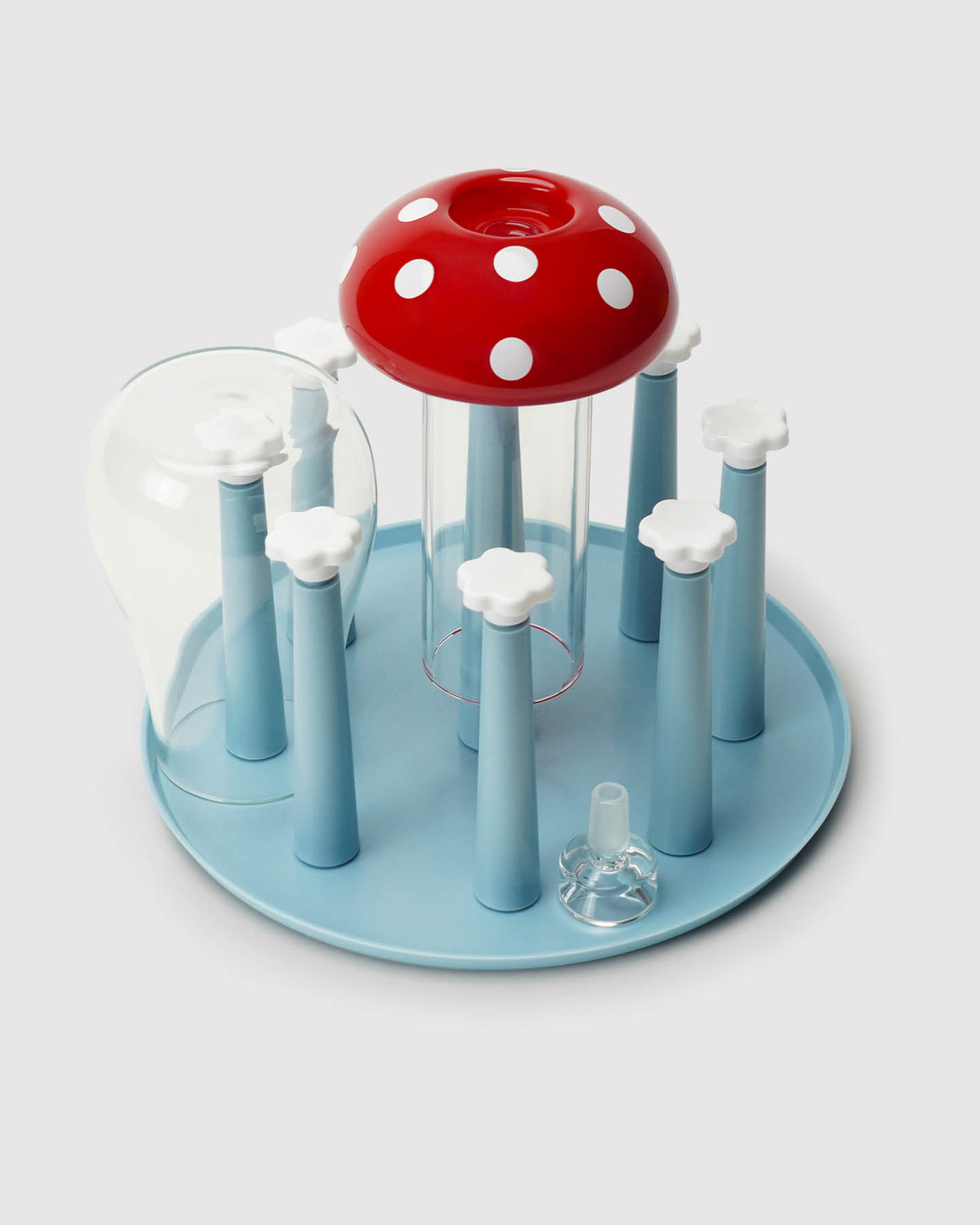 mushroom gravity bong drying on blue dry rack