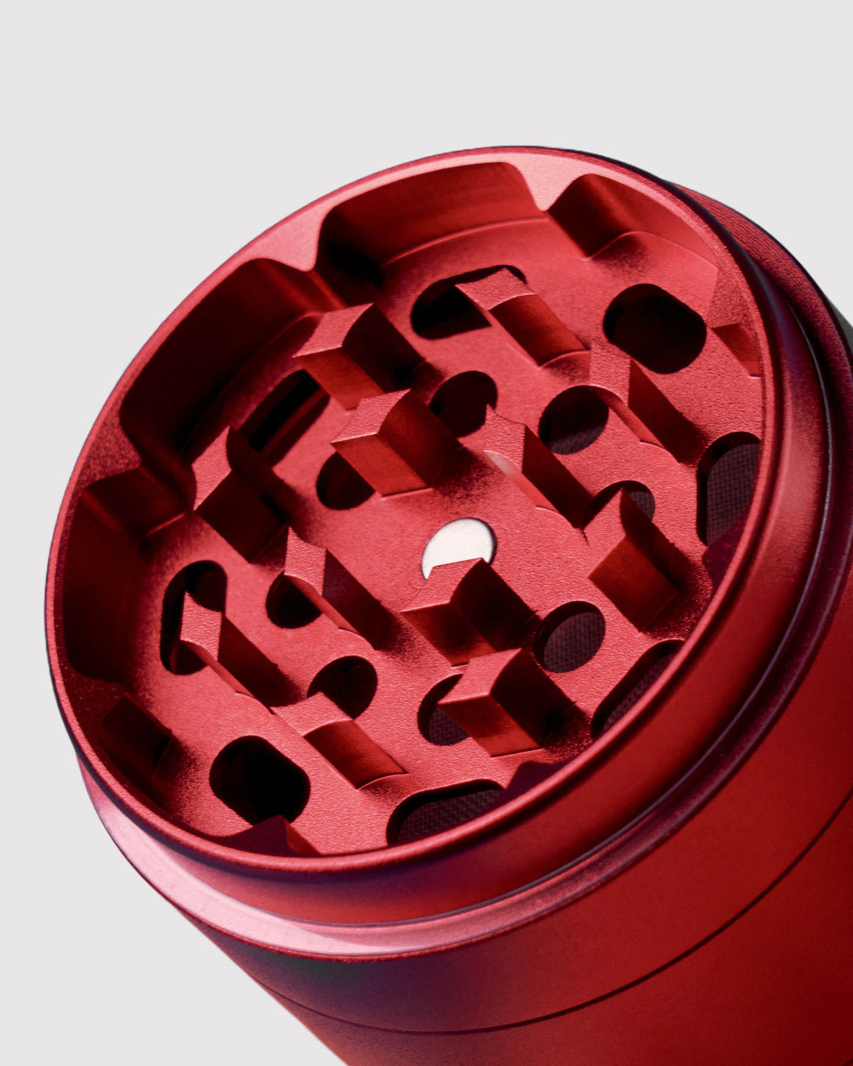 closeup of red mushroom grinder