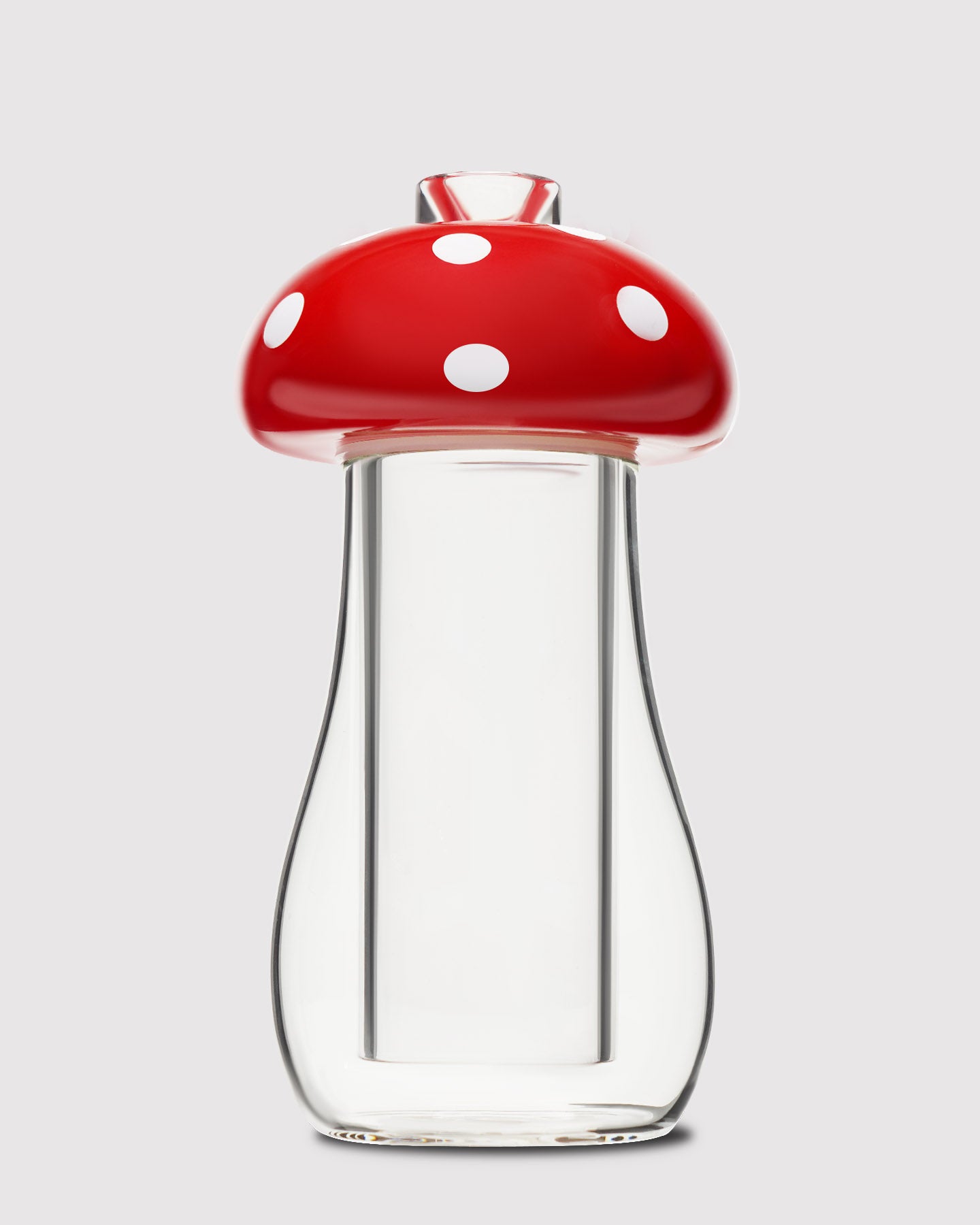 red mushroom gravity bong against white background