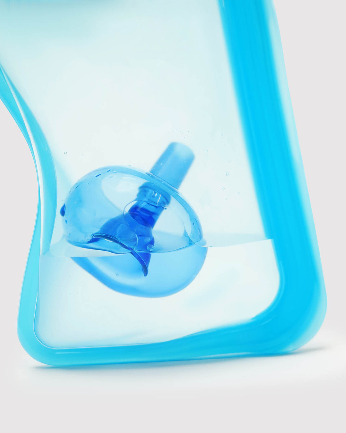 soaking bong bowl in blue reusable cleaning pouch