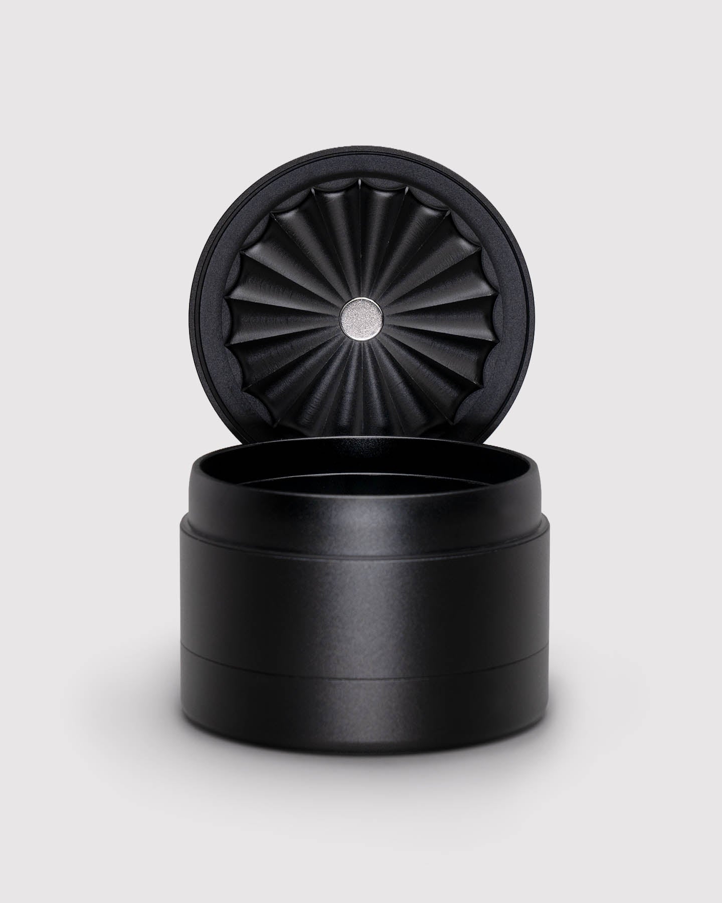 top of grinder is opened to display toothless design