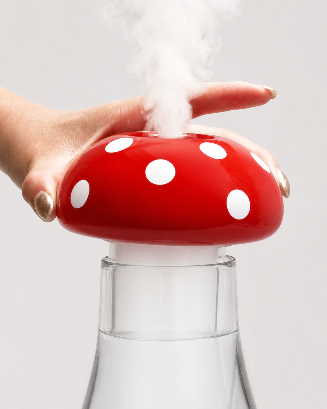 closeup of mushroom gravity bong in use