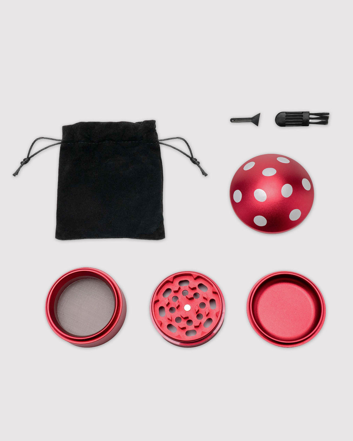 what's included image, red mushroom grinder disassembled with carrying pouch and cleaning tools