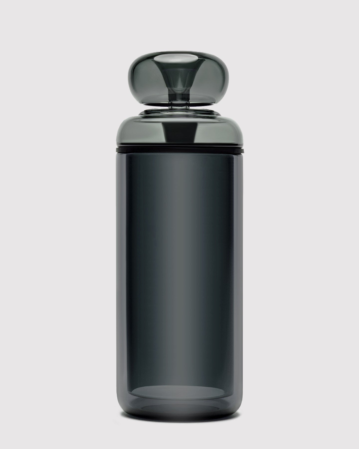 black glass gravity bong against white background