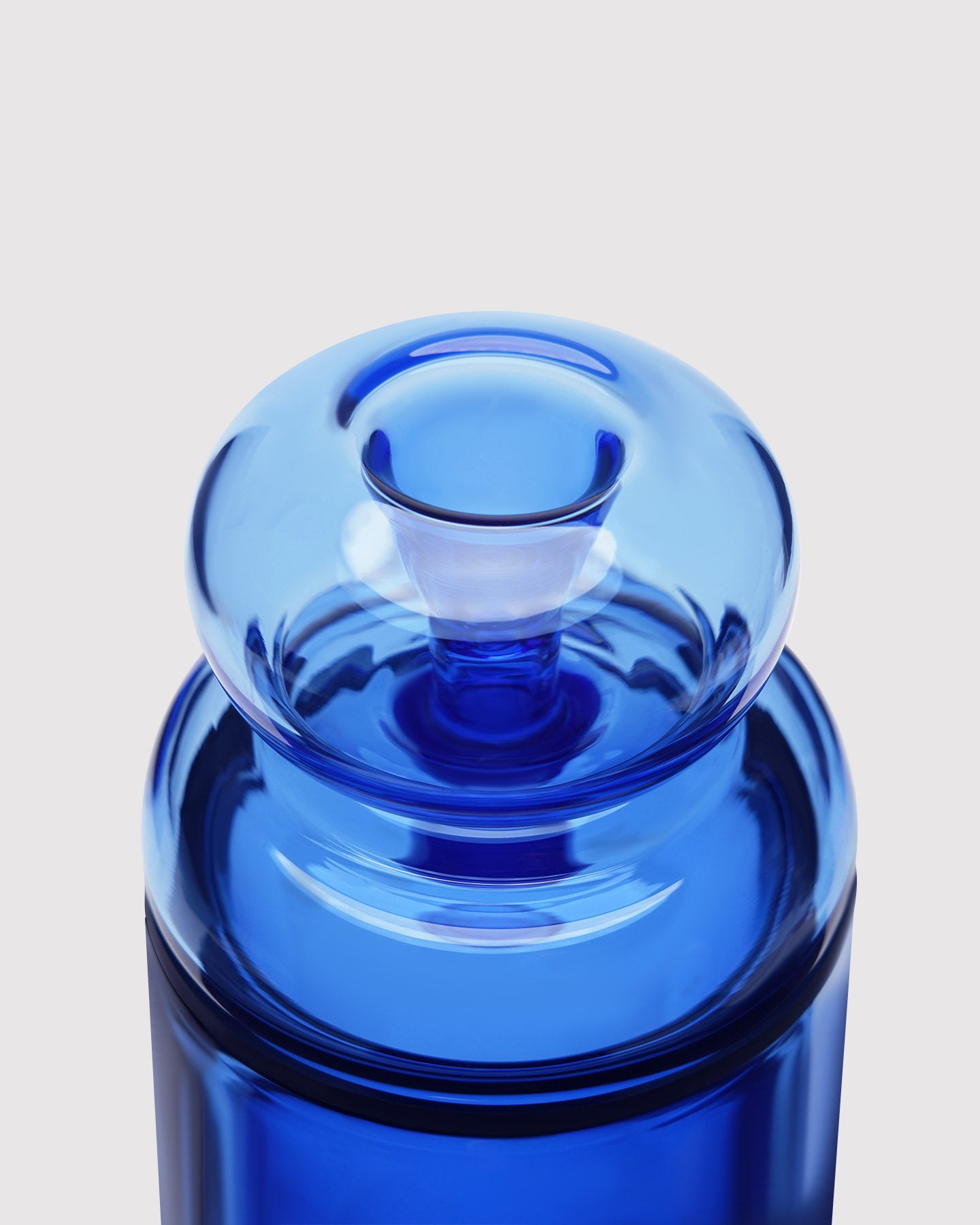 blue glass gravity bong top view 