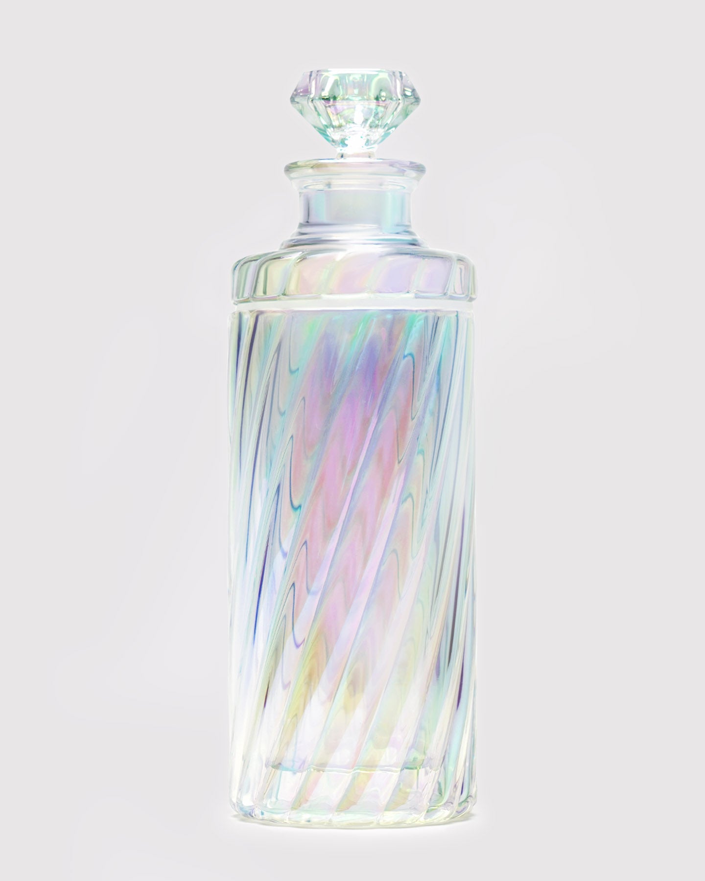 iridescent decanter gravity bong against white background