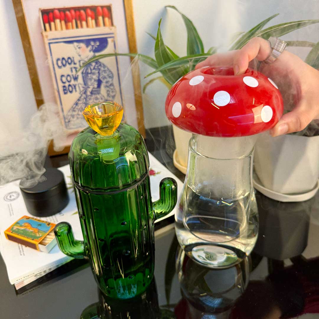 cactus and mushroom gravity bong in use 