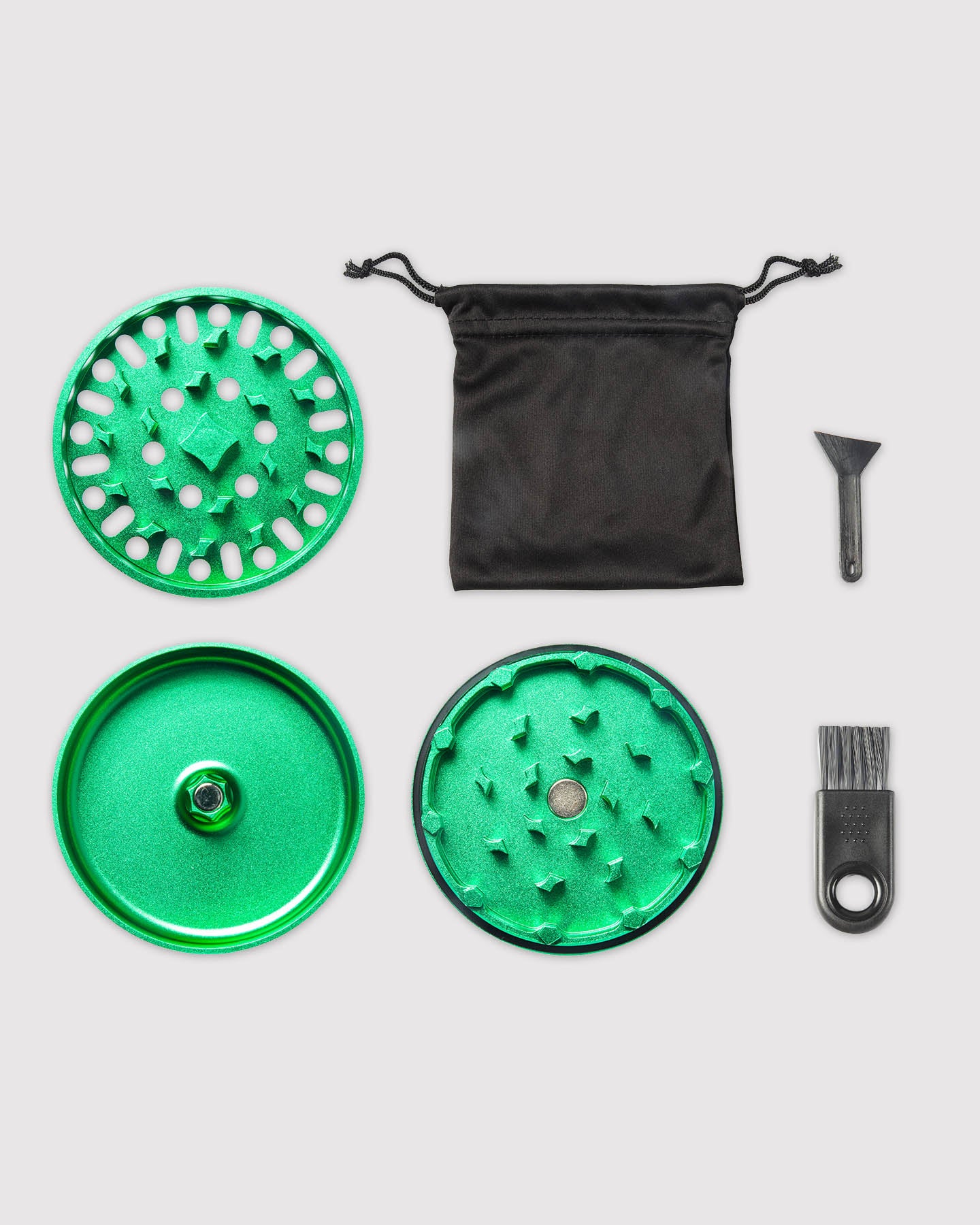 what's included image, green magnetic grinder disassembled with carrying pouch and cleaning tools 